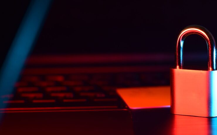 Padlock on laptop keyboard representing password and device security